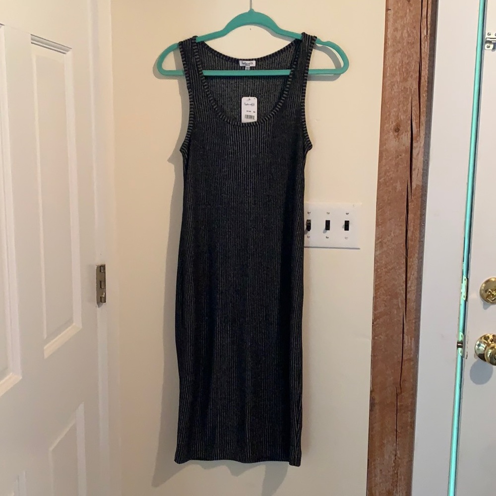 Comfy little black dress- knee length
